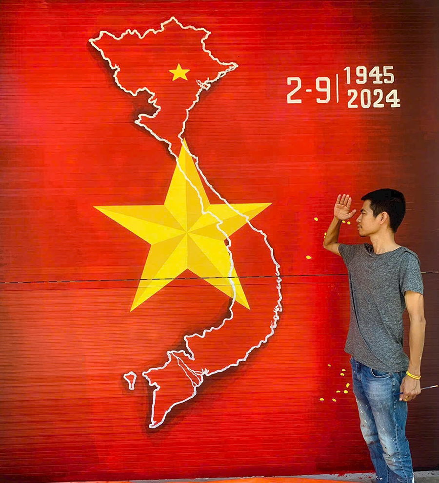 Vẽ tranh cửa cuốn lá cờ tổ quốc tại quán Trà Phố - Hoài Đức - Hà Nội