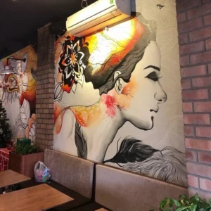 Vẽ tường quán cafe hình cô gái ấn tượng